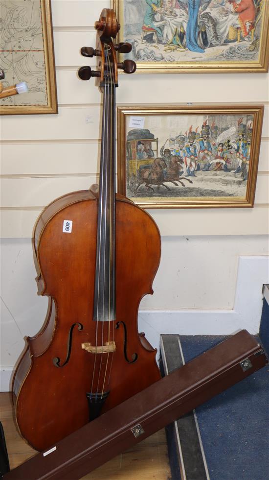 A cello and two bows, cello height 123cm